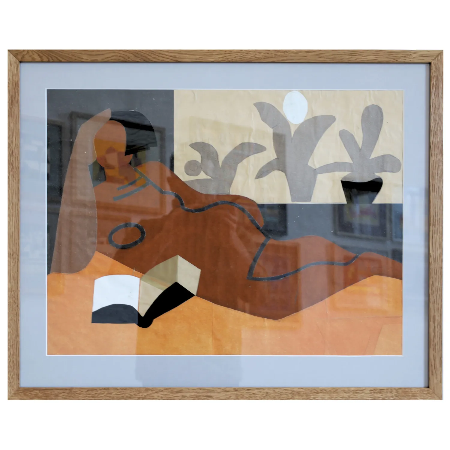 Image of Woman with a book by Dmytro Paruta, size: 45 х 60 см, made of сolored paper, аppliqué, priced at $350